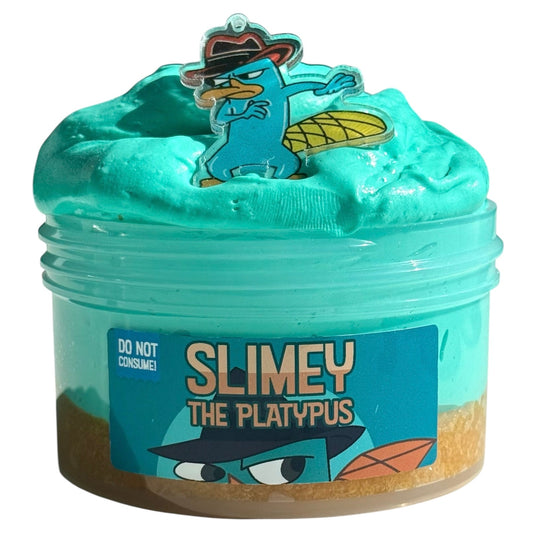 The Slimey the Platypus Teal Butter Slime (7 oz) features a snow fizz add-on, lime frosted cupcake scent, and comes with a Perry sticker. DO NOT CONSUME! Enjoy its fun texture and playful design.