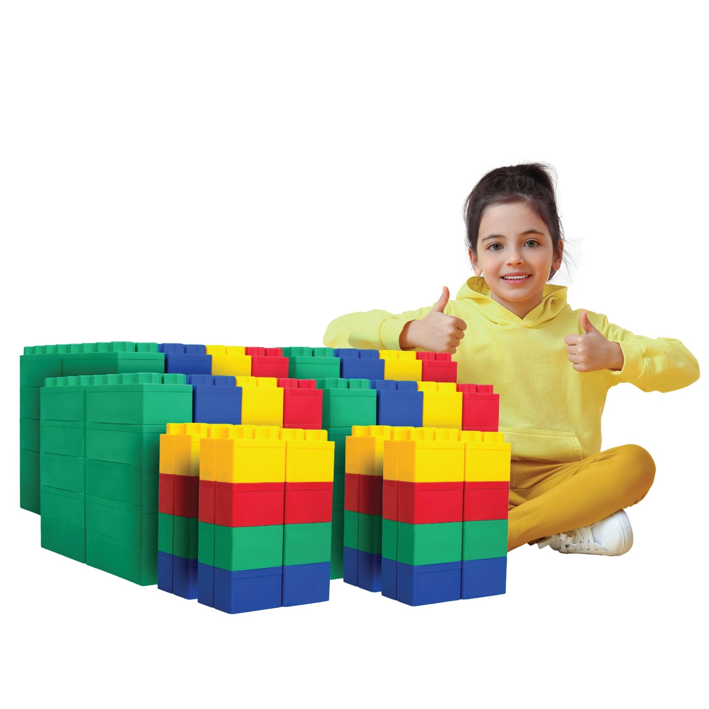 A smiling child in a yellow outfit sits cross-legged, giving two thumbs up beside stacks of green, red, yellow, and blue Jumbo Building Blocks 192 PC - Jumbo Set against a white background.