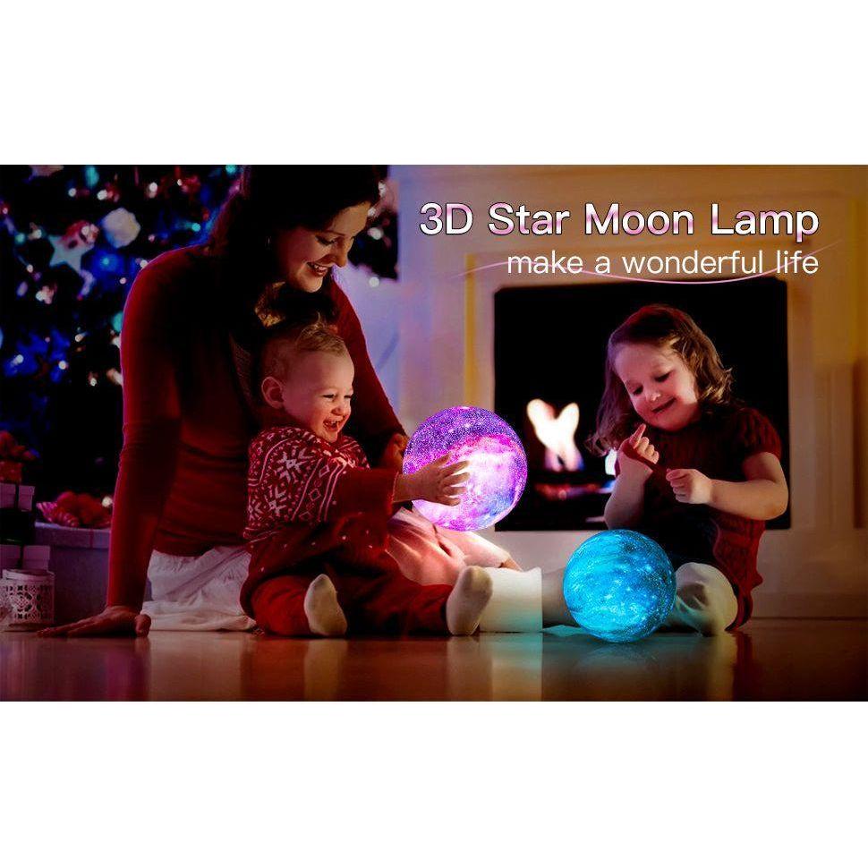 A woman and two kids cozy up by a fire with pink and blue Celestial 3D Moon Lamps. A twinkling Christmas tree glows nearby. Text reads, Celestial 3D Moon Lamp LED Night Light: An enchanting starry decor gift for kids and adults.