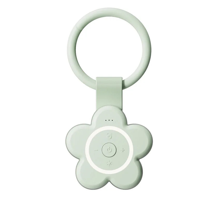 The Portable Newborn Baby Sleeping Gadget is a green, flower-shaped white noise device with a circular handle, front buttons, and indicator lights—ideal for soothing babies and adults with calming sounds.