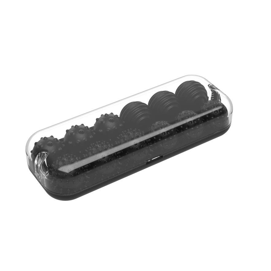 A transparent plastic container displays a row of ONO Sigbits fidget toys in Onyx, featuring both spiky and smooth, ridged textures—all neatly arranged on a white background.