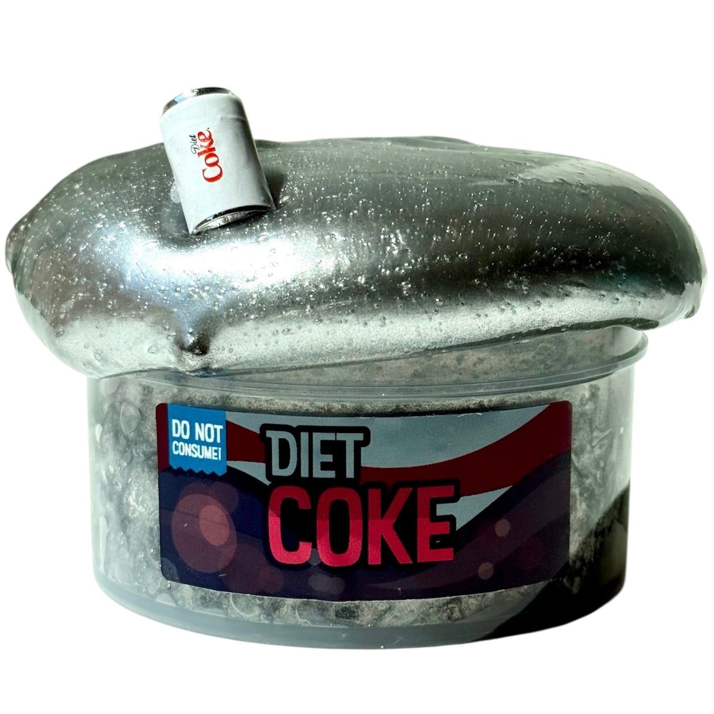 A Diet Coke Scent Lava Rock Slime 7 Oz with a Diet Coke charm, featuring premium silver-coated texture, overflows from its container like metallic fizz, with the can perched atop the shimmering, mushroom-shaped slime.