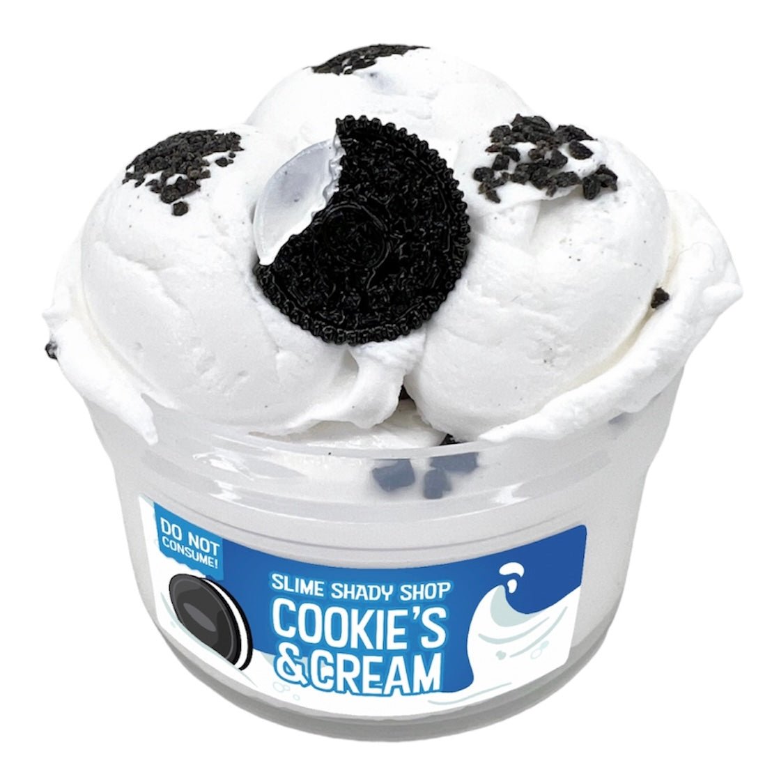 A white cup labeled “Cookies n Cream” holds three scoops of cloud cream slime, topped with crushed chocolate cookie pieces, a half cookie, and a cute cookie charm. A DO NOT CONSUME warning appears on the label.