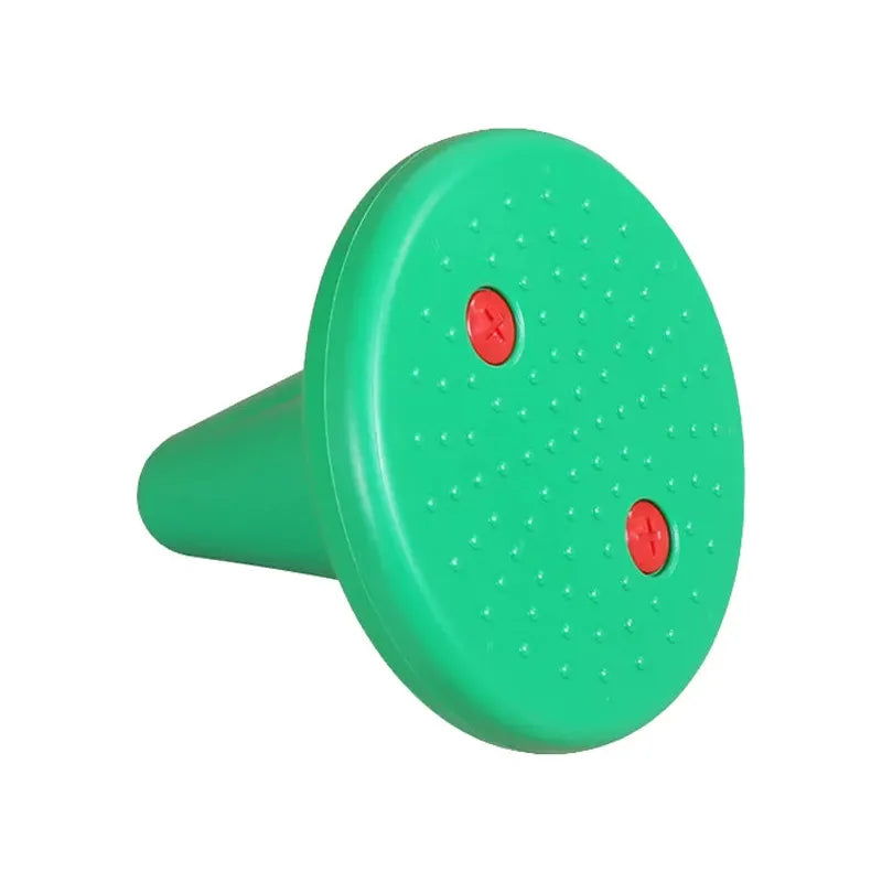 The Kids Balance Training Unicorner Chair with Throwing Ring is a green, flat disk-shaped toy with a conical base, small raised dots, and two red screw-like elements—perfect for developing motor skills, balance training, and tactile exploration in children.
