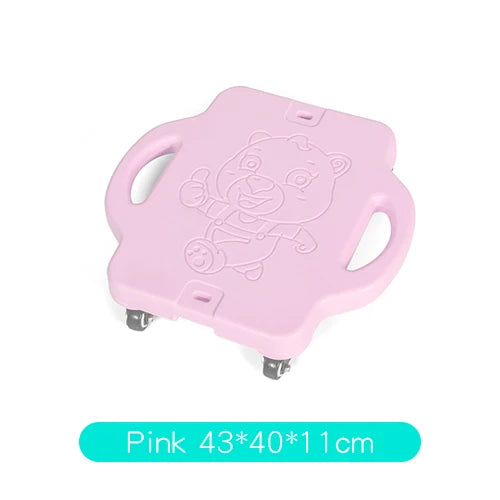 The Kids Sensory Balance Board, a pink plastic skateboard with handles and wheels, features a bear design. Its ideal for sensory training and motor skill development, with compact 43x40x11 cm dimensions for easy maneuverability and playful use.