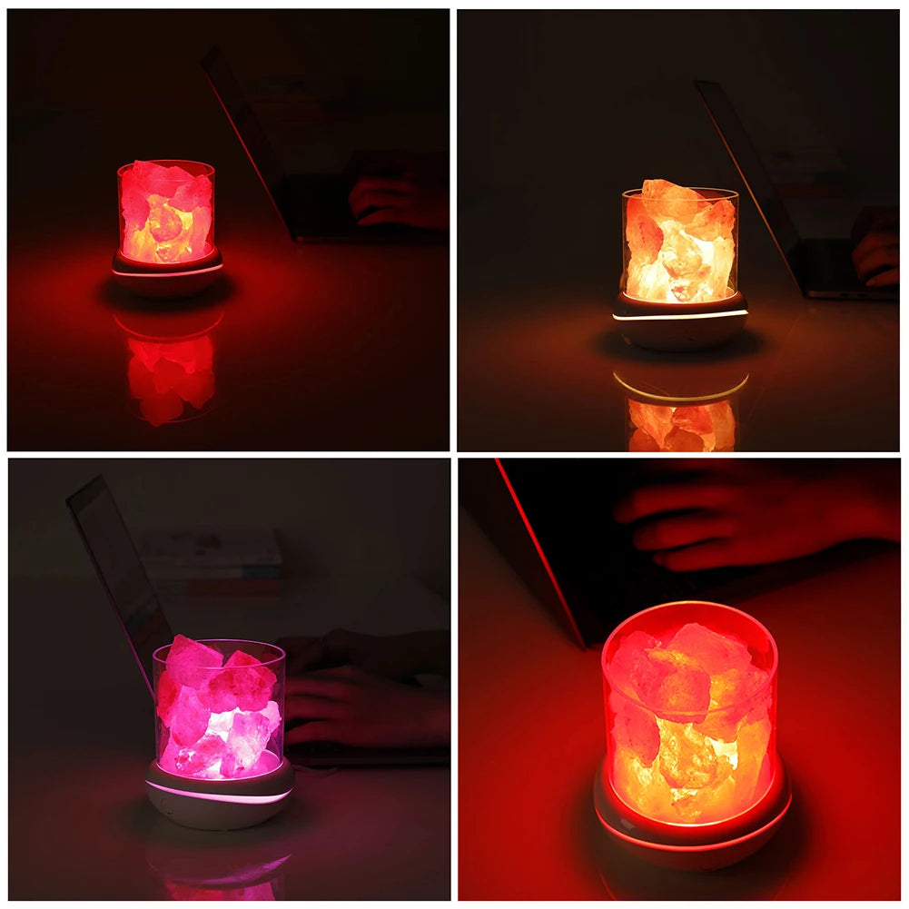 A collage of four images showcases the Crystal Salt Lamp with USB Aroma Purifier & LED Multicolor Night Light. The lamp casts a calming glow of red and orange hues on a smooth surface, with two images showing hands using a laptop nearby, creating a serene bedroom atmosphere.