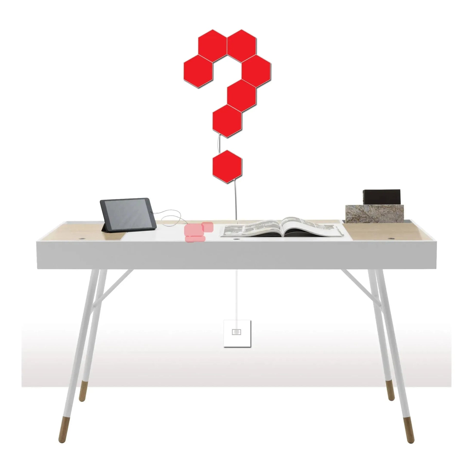 A white desk with an open magazine, tablet, and stacked books. Above, Hexagonal LED Modular Night Light Panels for Sensory Rooms – Calming Splicing Geometry Lamps for Autism form a question mark; color-changing via remote control.