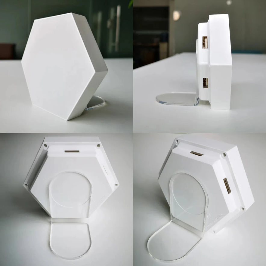 The Hexagonal LED Modular Night Light Panels for Sensory Rooms are white, feature color-changing options, a transparent stand, USB ports, and remote control. Shown from various angles; ideal calming lamps for autism.