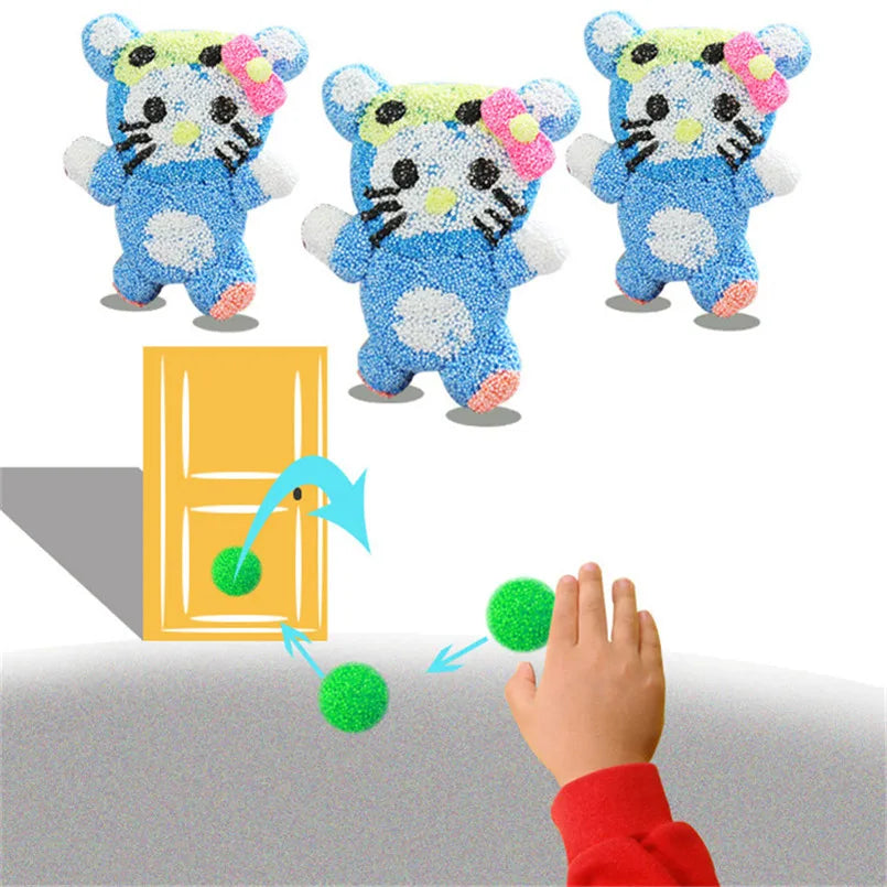 A child in a red sleeve rolls a green fuzzy ball toward a wooden door. Nearby, vibrant fluffy slime from the Air Dry Fluffy Slime Set enhances the scene. Above, three plush tigers with blue bodies and colorful bows are displayed. An arrow shows the balls movement toward the door.