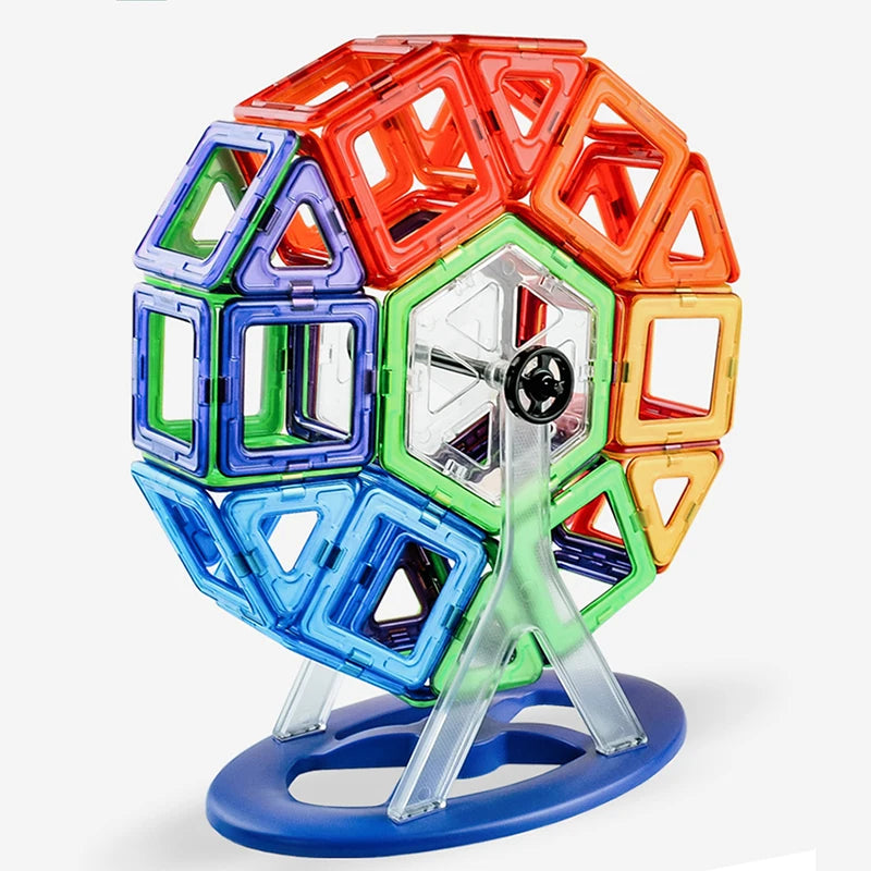 The Giant Magnetic Building Blocks Set allows kids to construct a colorful Ferris wheel-like structure with red, orange, yellow, green, blue, and purple squares and triangles. Built from safe, durable materials, it promotes STEM learning and features a blue base with clear plastic supports.