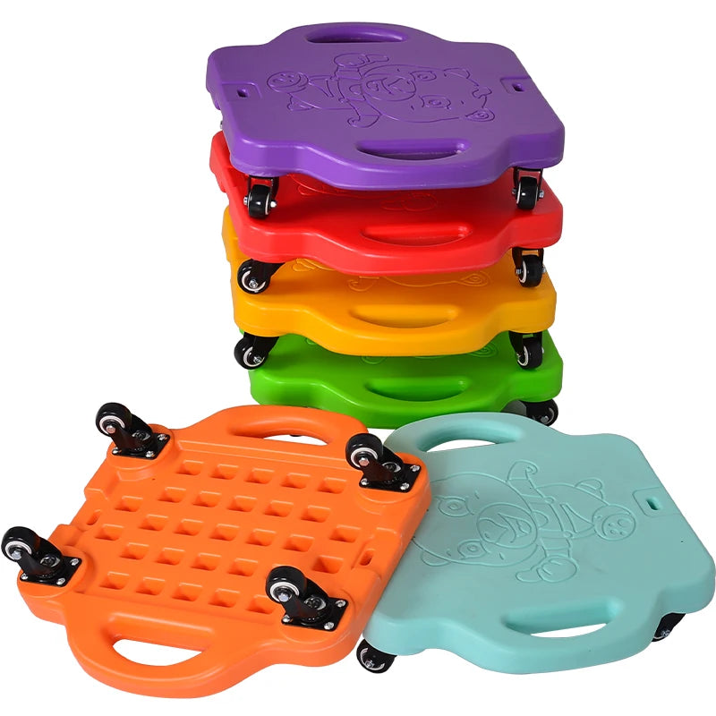 A colorful stack of Kids Sensory Balance Boards, in purple, red, yellow, green, orange, and blue, features handles and wheels. These textured four-wheeled skateboards are perfect for enhancing childrens motor skills. An orange board flipped over highlights its role in sensory training.