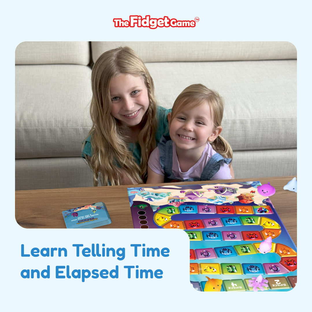 Two smiling girls play the Squishy Time Rescue Telling Time Game, using a colorful path and small silicone animal figures to learn about analog and digital clocks on a table.