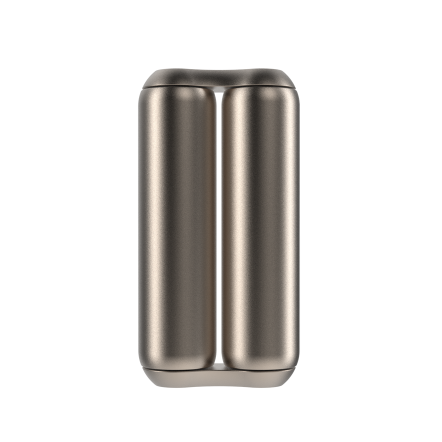 A sleek, metallic cylindrical object with two parallel columns joined side by side—the ONO Roller Titanium—ideal as desk decor or a premium fidget accessory, set against a white background.