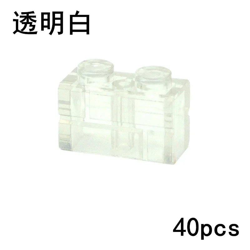 A set of 40 transparent building blocks (1x1, 1x2, 1x4, 2x4), perfect for Lego-compatible creations. Great for walls and house builds. Shown: clear brick with two studs. Product: MOC Transparent Bulk Brick Set—Color: Transparent-40pcs.