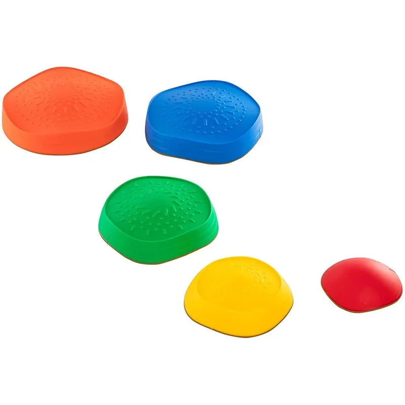 The Kids 5-Piece Outdoor Balance Stepping Stones Set features dome-shaped, textured stones in vibrant orange, blue, green, yellow, and red. They vary in size and are scattered on a pristine white background for coordination and obstacle play.