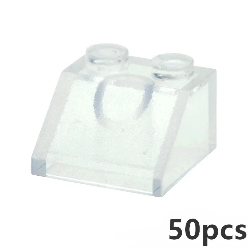 A set of MOC Transparent Bulk Bricks (1x1, 1x2, 1x4, 2x4) compatible with Lego is displayed on a white background. The 50pcs label at the corner highlights this perfect choice for expanding your clear building block collection.