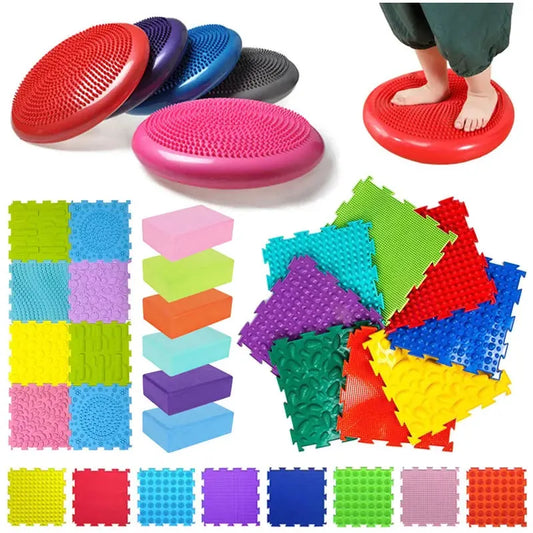 Discover the Montessori Sensory Integration Training Balance Stones for Kids—a vibrant collection of textured balance cushions, yoga blocks, and interlocking sensory tiles in red, blue, green, pink, and orange. Ideal for tactile sensory play and early learning.