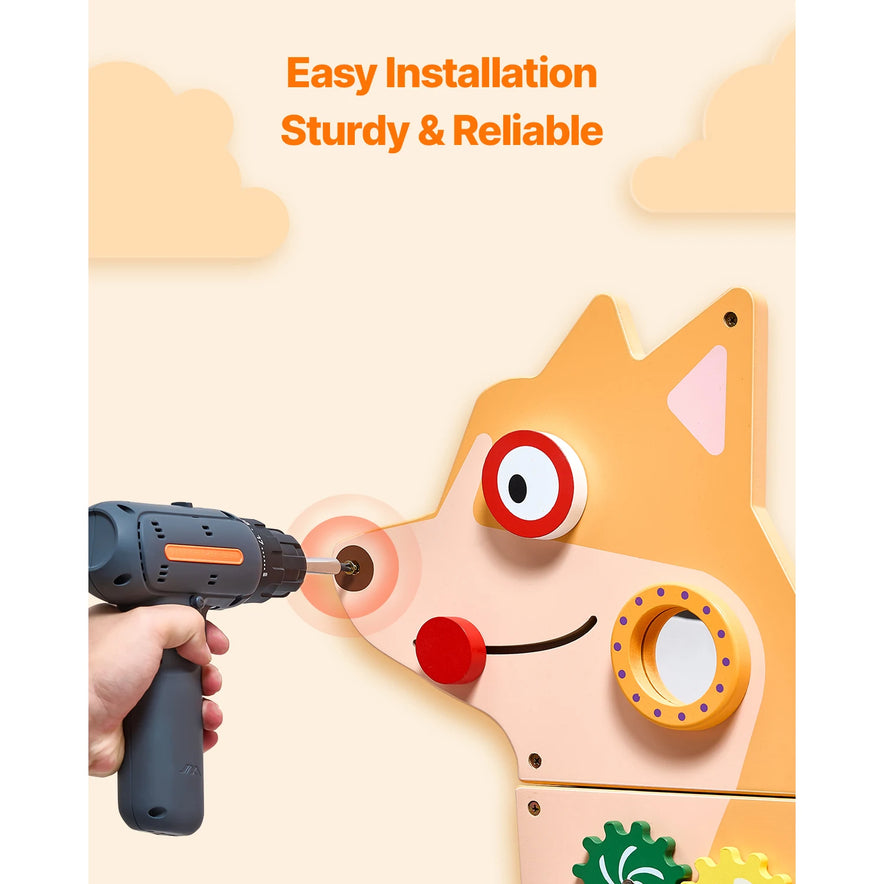 A hand uses a power drill to install a screw into the Vevor Puppy Kids Wall Busy Panel—a Montessori sensory activity center with 12 engaging activities. “Easy Installation Sturdy & Reliable” is written above in orange, with clouds in the background.