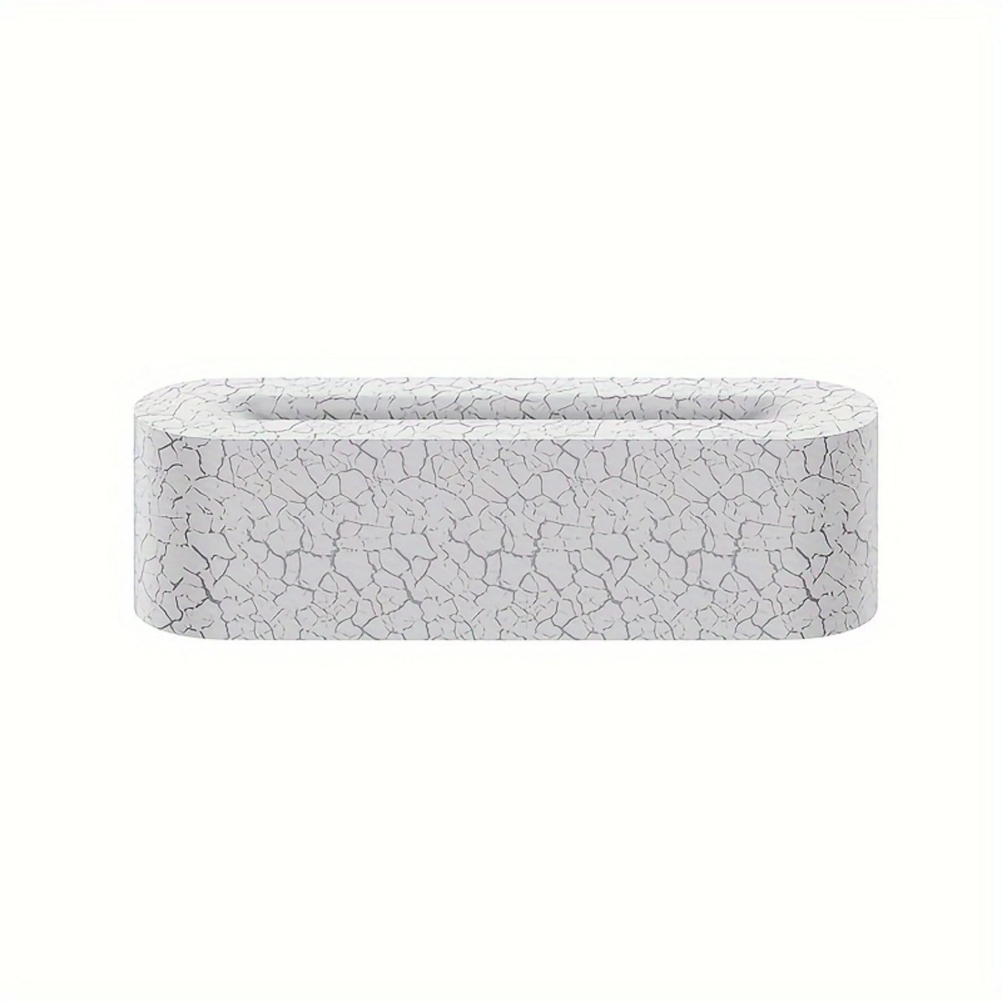 A white freestanding bathtub with a cracked marble pattern rests elegantly against a neutral backdrop, its rounded corners enhancing the serene ambiance, similar to the tranquility of a Lava Flame Cool Mist Humidifier with Color Changing Lamp nearby.