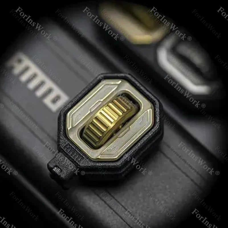 Close-up of a Titanium Gold gear set in black plastic, part of the Ammo Cracker Unzip Roller Fidget Toy Stress Relief Slider EDC Tool; the sharp image showcases textured details and its unique stress-relief design.