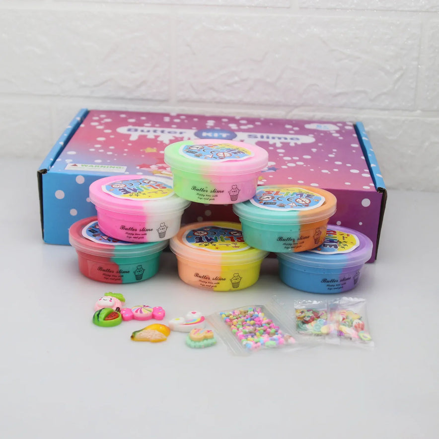 The Slime Fluffy Kit for Enfant features vibrant, safe, non-toxic slime in six colorful 50ml containers for creative play. Includes accessories: small bags of colored beads and food-shaped figurines, making this Cotton Mud Butter Mud DIY set delightful.