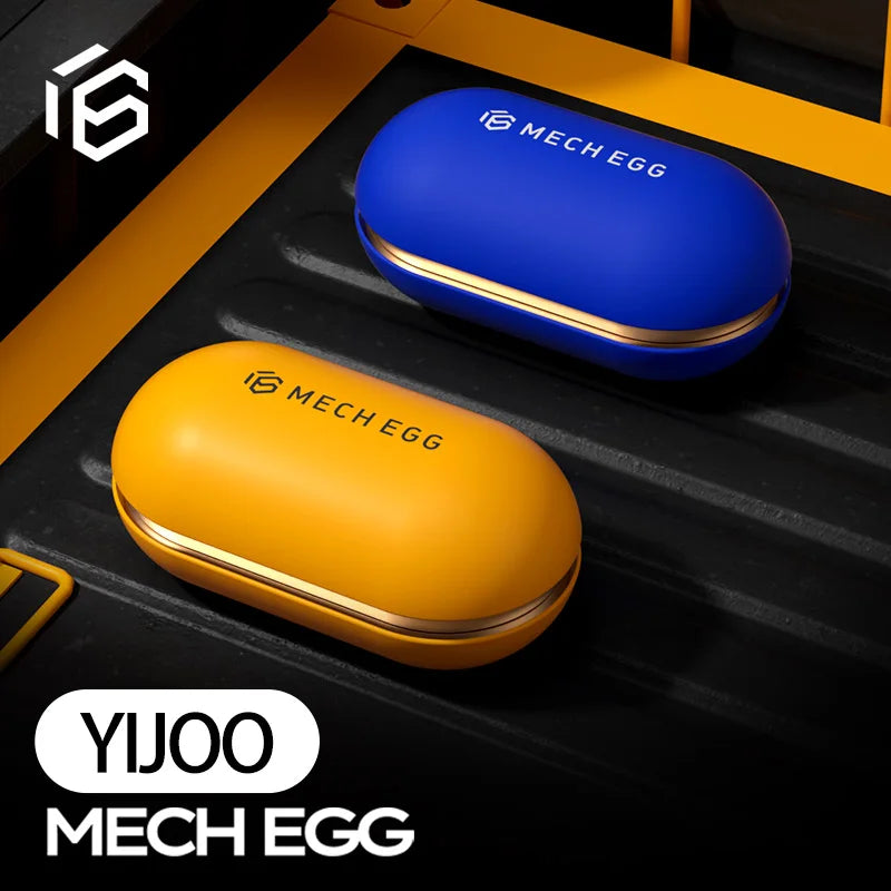 Two oval Mech Egg EDC Fidget Slider metal toys, one blue and one yellow, are displayed on a black surface. These adult stress relief tools feature bold YIJOO and MECH EGG branding in white at the bottom left corner.