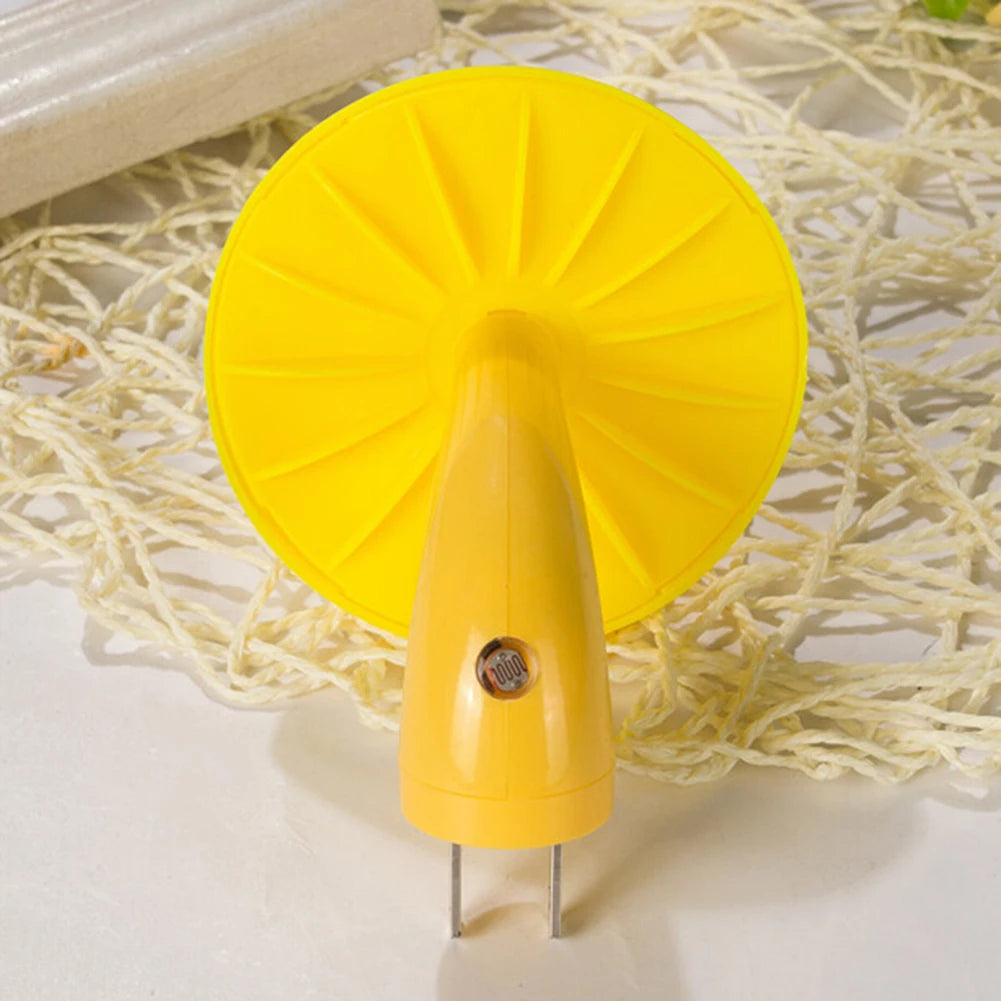 A Mushroom LED Night Light with Sensor Control in warm white, intended for kitchen use, rests on a textured cream surface. It has a detachable head similar to a citrus juicer, featuring an EU/US plug and emits a cozy glow to enhance your culinary spaces atmosphere.