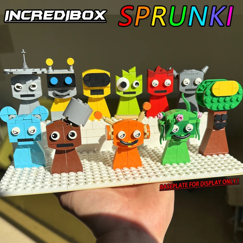 A hand holds a white baseplate with colorful LEGO characters from the New Moc Incredibox Sprunki Building Blocks Set (360pcs). INCREDIBOX and Moc Incredibox Sprunki are at the top; BASEPLATE FOR DISPLAY ONLY! appears bottom right.