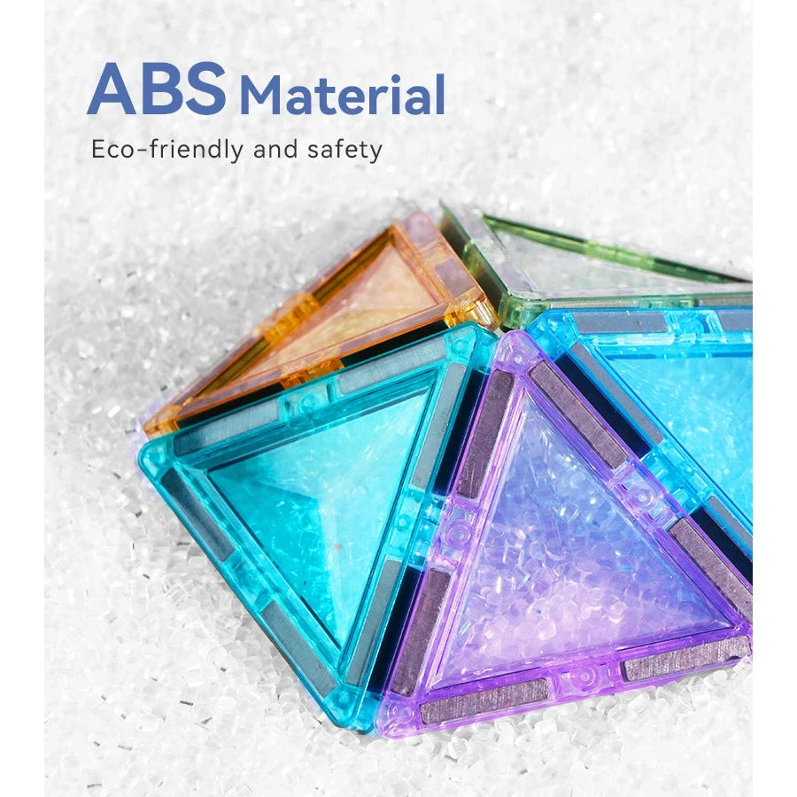 The Montessori Magnetic Building Blocks Set features triangular, colorful, translucent ABS tiles designed for interactive learning, arranged on clear beads. The upper left corner displays ABS Material and highlights Eco-friendly and safety.