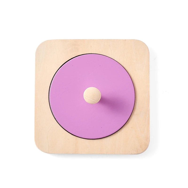 The Silicone Montessori Sensory Activity Board Fidget Toy for Kids comes in purple, featuring a central knob for easy grip—perfect for encouraging exploration, tactile play, anxiety relief, and mindfulness.