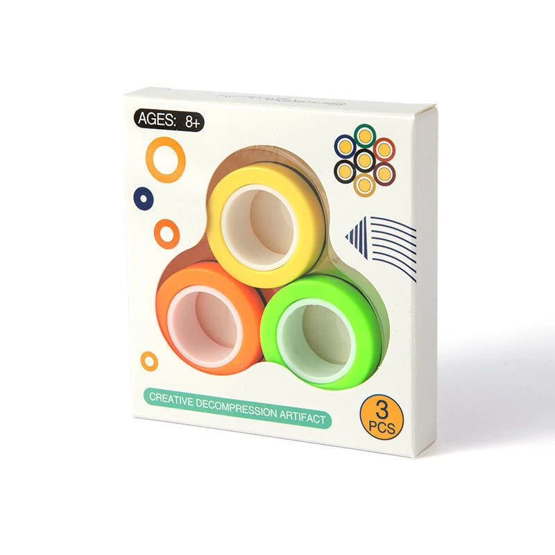 The 3PCS Finger Magnetic Rings Fidget Toys for Anxiety, ADHD, and stress relief come in orange, yellow, and green. Suitable for ages 8+, these fun gadgets feature playful packaging with colorful graphics—perfect for fidgeting anytime.