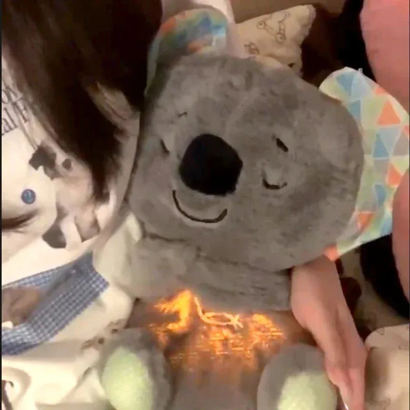 A person holds a Soothing Otter Musical Plush Toy, a charming sensory sleep companion for newborns, with light and sound features. Theyre wearing a sweater with a teddy bear design, enhancing the cozy ambiance.