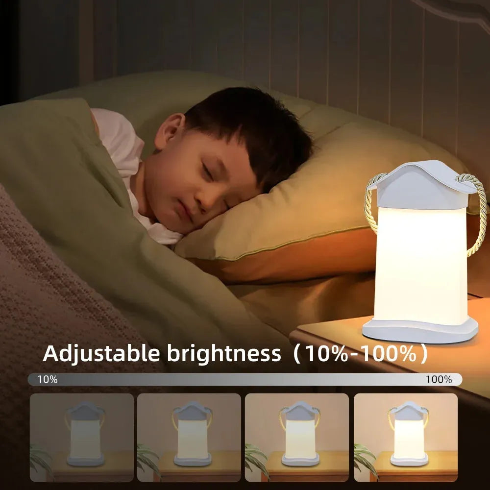 A child sleeps peacefully with a Rechargeable Dimmable Touch LED Night Light, featuring a handy rope handle. USB rechargeable, it offers adjustable brightness from 10% to 100% for the ideal bedtime ambiance.