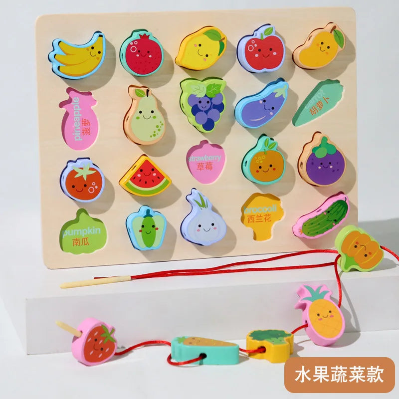 The New Children Wooden Toys feature cartoon fruit and vegetable pieces, like bananas and apples, with some bearing Chinese labels. A red string weaves through them, creating an educational threading toy. Ideal for imaginative play, these are also known as Wooden Stringing Beads for kids.
