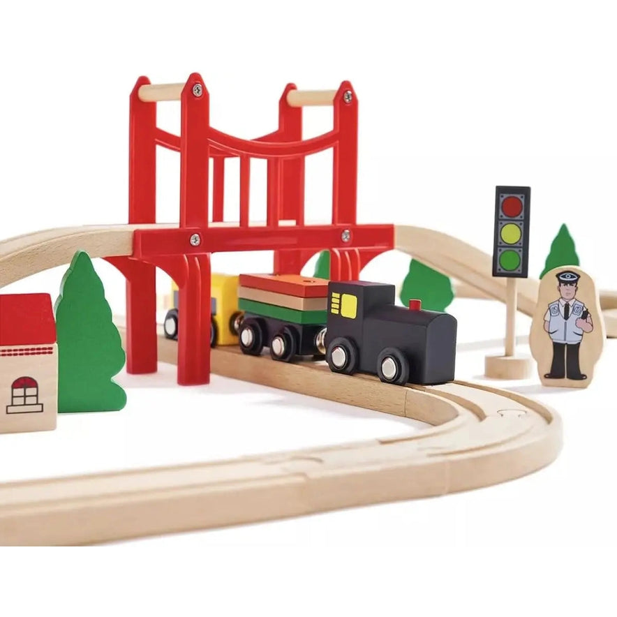 The Wooden Train Set includes 39 pieces: tracks, train cars, red bridge, trees, traffic light, building, and a police officer figure. No batteries needed. Compatible with Thomas, Brio, IKEA & Melissa and Doug. For kids ages 7-12.