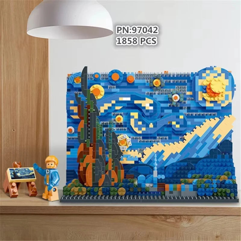 Creative Art Van Gogh Paintings The Starry Night and The Great Wave of Kanagawa Micro Building Blocks (PN:97042, 1858 PCS) are displayed on a shelf with a lamp, featuring a small figure and mini easel holding a tiny painting.