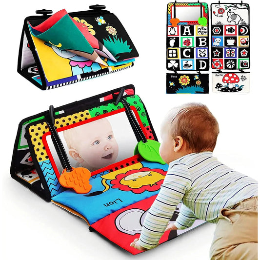 A baby engages with the Crinkle Cloth Book Visual Stimulation Toy, featuring colorful patterns, animal illustrations, a tummy time mirror, textured fabric, and teething toys for sensory exploration and brain development.