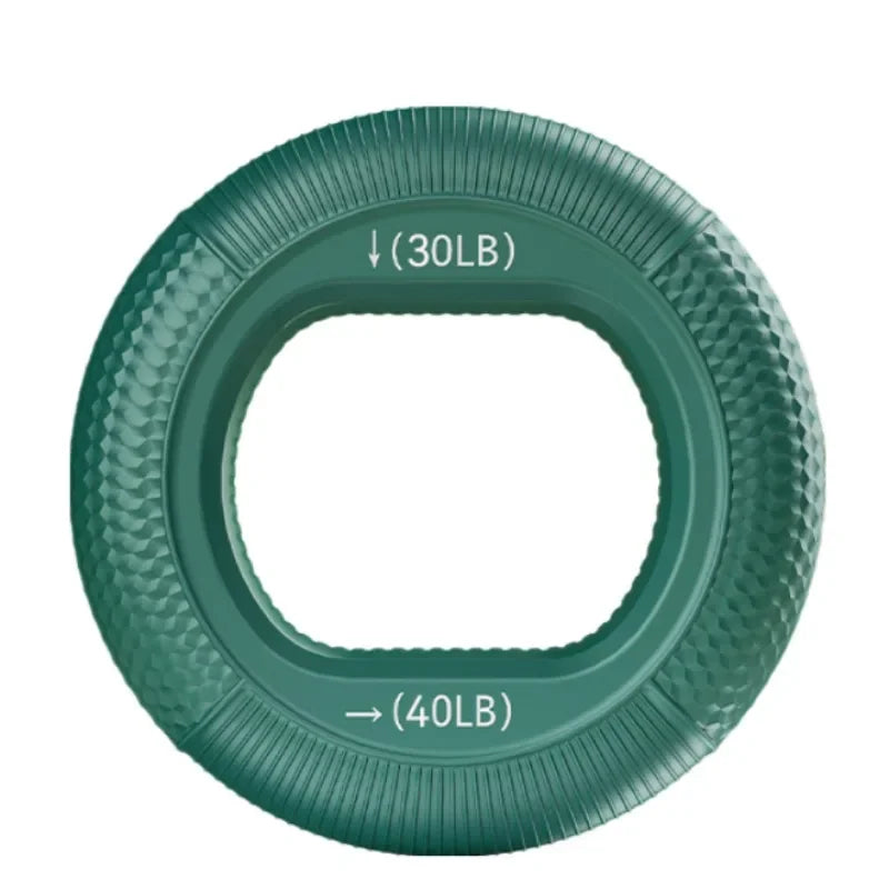 The Silicone Grip Trainer Ring is a green resistance fitness device with a textured surface, circular outer shape, and rounded square inner shape. It features 30LB at the top and 40LB at the bottom, ideal for enhancing hand strength and wrist rehabilitation.