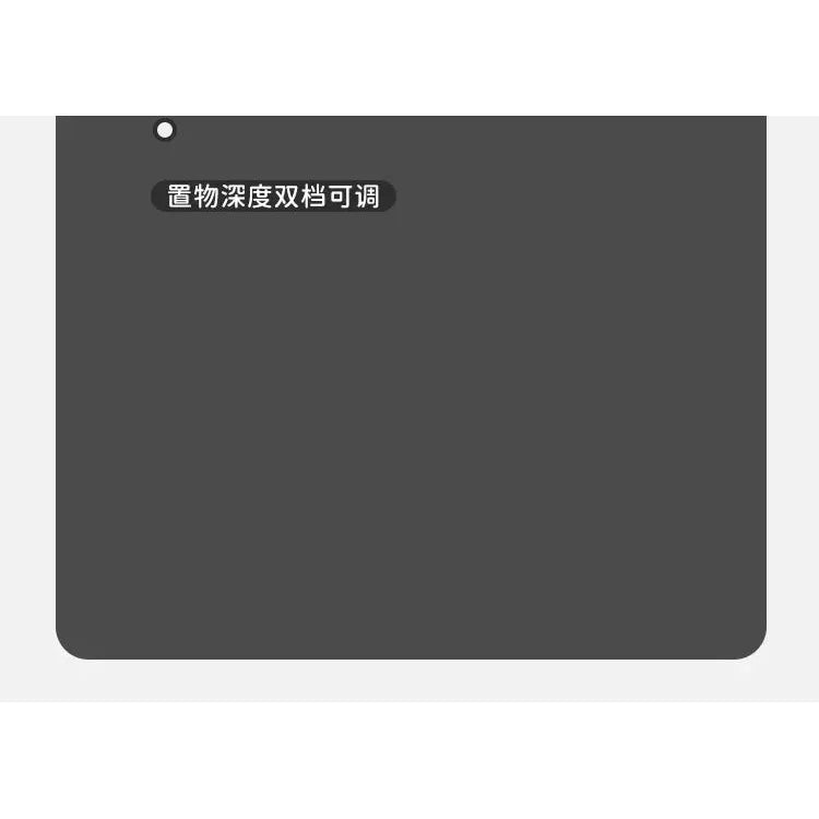A gray, rectangular mouse pad with rounded corners features a black button on the left with Chinese text translating to object depth dual gear adjustable, showcasing design elegance reminiscent of the Versatile Solid Wood Childrens Bed with Climbing Frame and Swing Features, against a crisp white background.