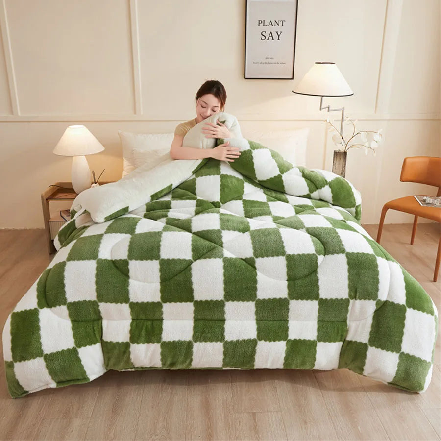 Wrapped in a KDJEIKZ Ultra Cozy Winter Weighted Blanket, a person relaxes on the bed with its luxurious milk velvet feel and restful warmth. The checkered green and white design complements the rooms small lamp, chair, wall poster, and light wood floor that enhances the cozy ambiance.