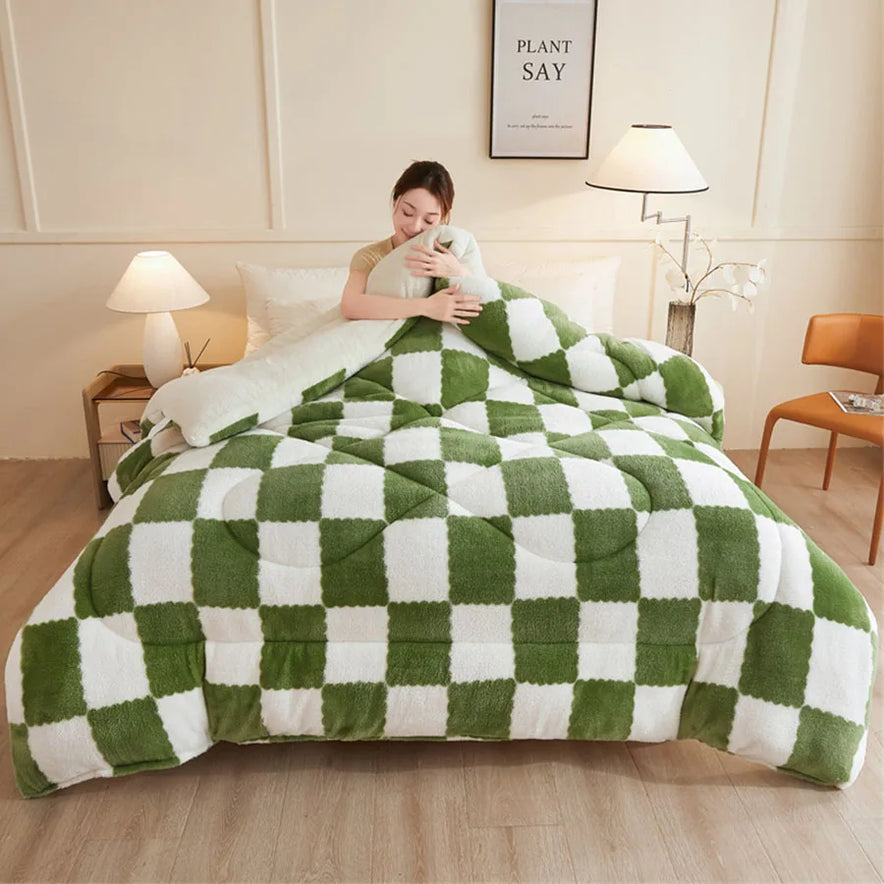 Wrapped in a KDJEIKZ Ultra Cozy Winter Weighted Blanket, a person relaxes on the bed with its luxurious milk velvet feel and restful warmth. The checkered green and white design complements the rooms small lamp, chair, wall poster, and light wood floor that enhances the cozy ambiance.