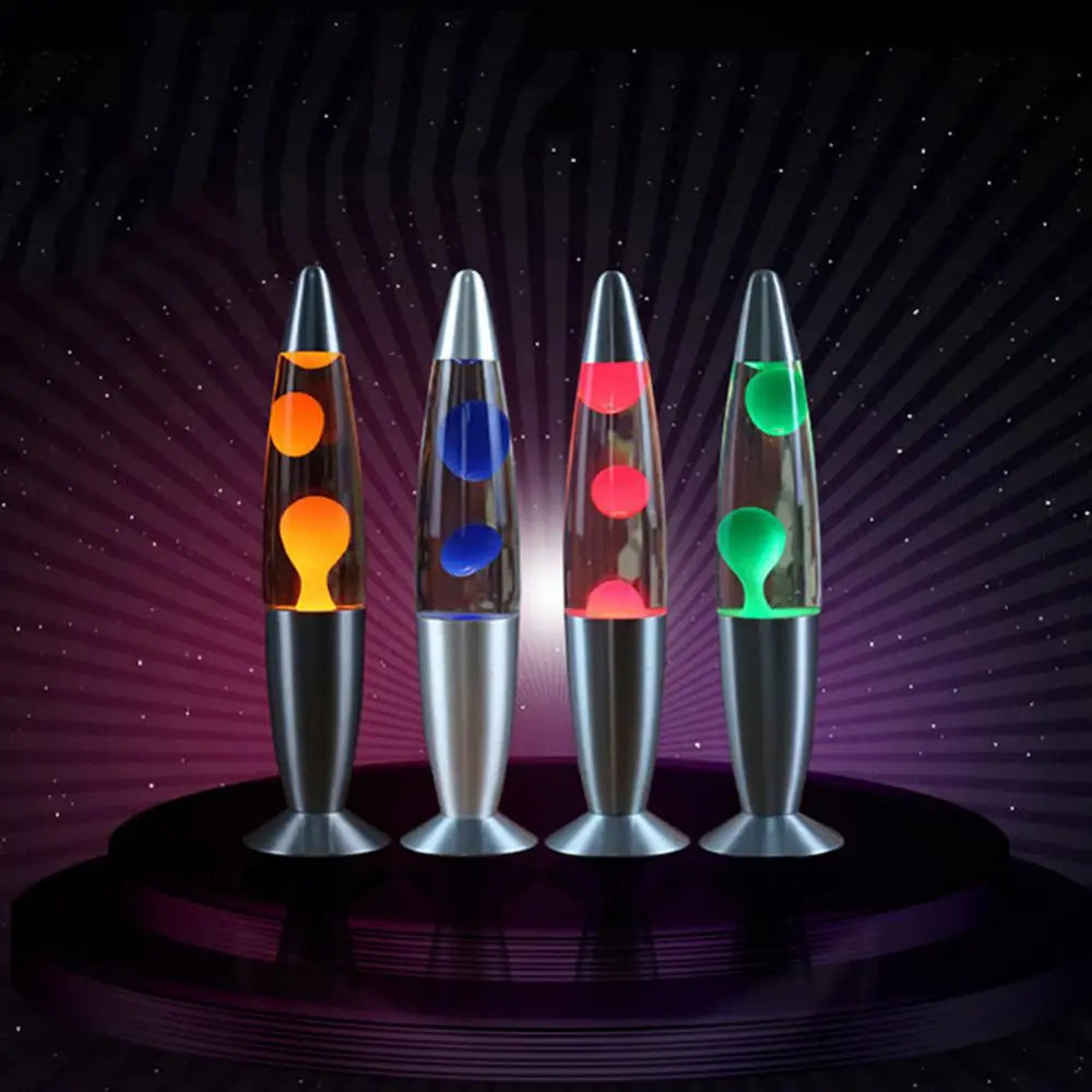 Four mesmerizing Jellyfish Lava LED Night Lights sit on a starry backdrop, showcasing colorful wax—orange, blue, red, and green—on circular platforms. These lamps create a vibrant retro atmosphere with an enchanting glow akin to decorative jellyfish. Perfect for kids rooms and home ambiance.
