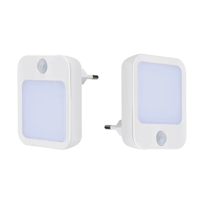The Dimmable Motion Sensor LED Night Light with EU Plug offers a sleek, rectangular design and energy-efficient illumination with a frosted front panel for babys room, bedroom, or corridor. It features motion sensors at the bottom for reliable lighting and low power use.