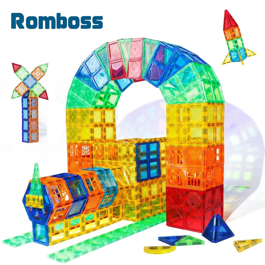 The Romboss Magnetic Educational Architecture Puzzle includes colorful translucent tiles in blue, green, yellow, and red for crafting shapes like tunnels, windmills, and rockets. This STEM toy promotes creativity and proudly displays the brand name at the top left.