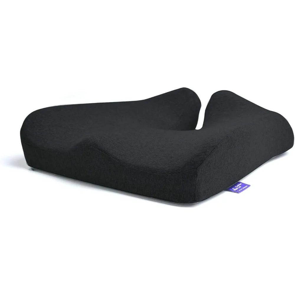 The Cushion Lab Patented Pressure Relief Seat Cushion is black with a U-shaped cutout for ergonomic support. It features a side tag and a 100% cotton cover, providing comfort during long sitting hours on office chairs, home chairs, cars, or wheelchairs.