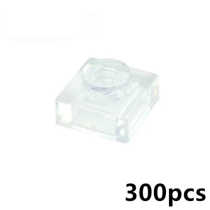 A transparent MOC Bulk Brick Set (1x1, 1x2, 1x4, 2x4) is shown on a white background. “300pcs” in black font appears bottom right—ideal for building block wall panels or house parts compatible with LEGO.