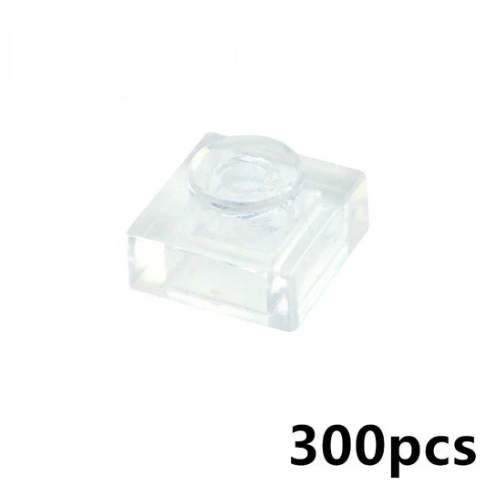 A transparent MOC Bulk Brick Set (1x1, 1x2, 1x4, 2x4) is shown on a white background. “300pcs” in black font appears bottom right—ideal for building block wall panels or house parts compatible with LEGO.