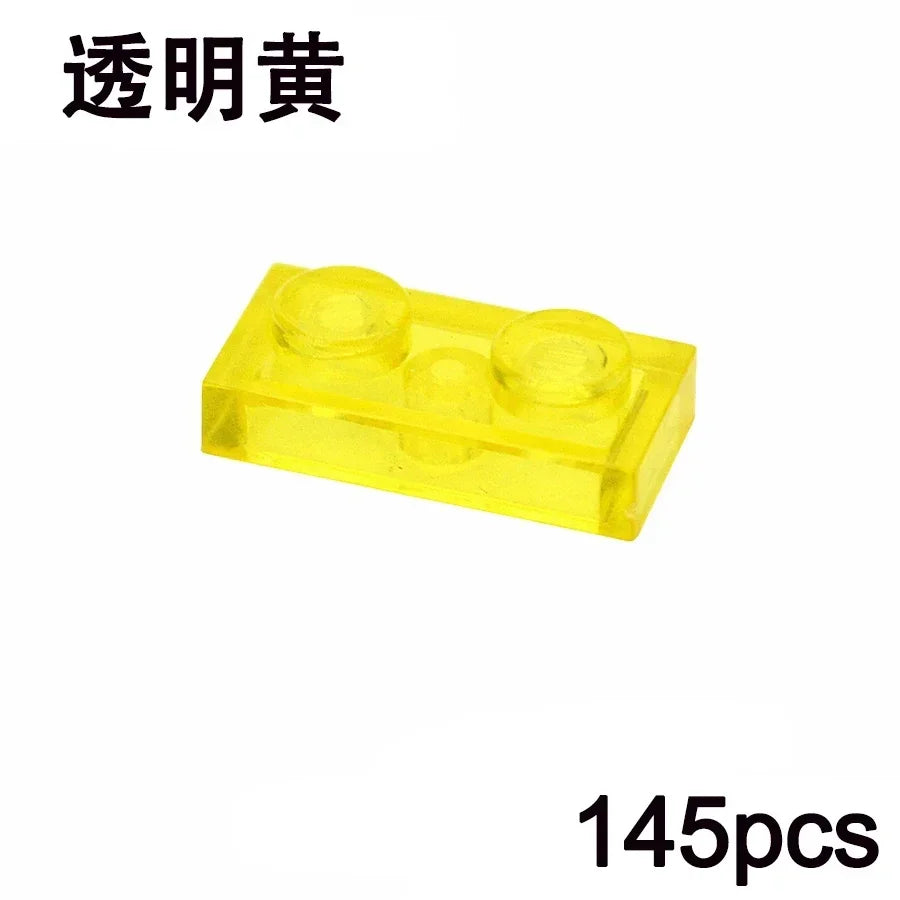 A clear yellow MOC Transparent Bulk Brick Set, compatible with Lego, includes 1x1, 1x2, 1x4, and 2x4 building block pieces. The image shows 145pcs and Chinese text at the top left—ideal for your collection.