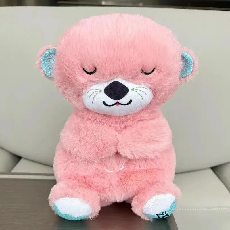 A burgundy plush toy, the Soothing Otter Musical Plush Toy with Light and Sound for Newborns, sits upright with crossed arms on a sofa. Its a perfect sensory sleep companion and comfort gift for any nursery setting.
.