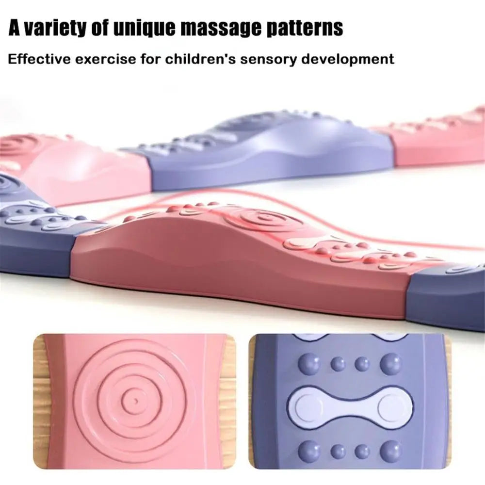 Close-up of a flexible Sensory Balance Beam Training Board in pink and purple, with swirls and bumps. Enhances physical coordination and motor skills development—featuring unique massage patterns for effective exercise in childrens sensory development.